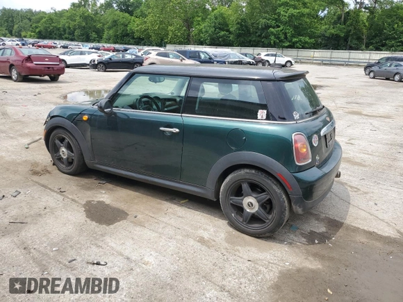 2007 MINI Hardtop with VIN WMWMF33537TL77985, listed as a Copart auction lot 61908635 with 180,470 mi miles and Salvage title. Bid and sale history available at DreamBid. Image 2.