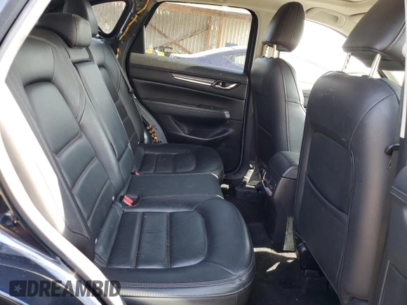 2021 Mazda CX-5 Grand Touring with VIN JM3KFBDM3M1344784, listed as a Copart auction lot 58051445 with 69,593 mi miles and Salvage title. Bid and sale history available at DreamBid. Image 11.