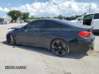 2016 BMW M4 with VIN WBS3R9C52GK338151, listed as a Copart auction lot 64882884 with Not Provided miles and Salvage Title. Bid and sale history available at carsss.com. Image 2.