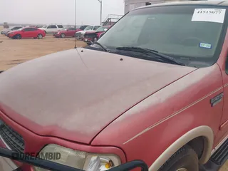 1998 Ford Expedition XLT with VIN 1FMRU17L0WLC05452, listed as a IAAI auction lot 41515077 with 113,219 mi miles. Bid and sale history available at carsss.com. Image 6.