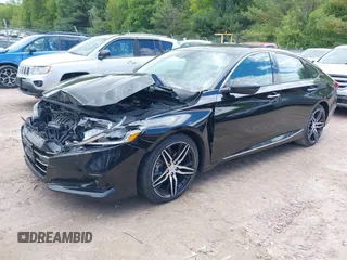2021 Honda Accord Touring z VIN 1HGCV2F91MA022042, wystawiony jako IAAI lot #42301183 z przebiegiem 67 397 mil mil oraz . Historia ofert i sprzedaży dostępna na DreamBid. Obrazek 2.