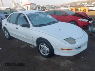 1998 Pontiac Sunfire SE z VIN 1G2JB5245W7563335, wystawiony jako IAAI lot #41884140 z przebiegiem 174 331 mil mil oraz . Historia ofert i sprzedaży dostępna na DreamBid. Obrazek 1.
