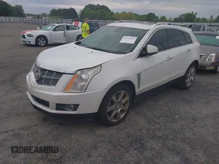 2011 Cadillac SRX Performance Collection with VIN 3GYFNBEY7BS585753, listed as a IAAI auction lot 42114525 with 233,329 mi miles and . Bid and sale history available at carsss.com. Image 2.