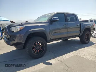 2019 Toyota Tacoma SR with VIN 3TMCZ5AN3KM204706, listed as a Copart auction lot 64670675 with 76,315 mi miles and Salvage title. Bid and sale history available at DreamBid. Image 1.