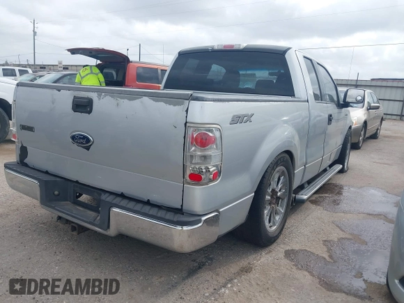 2006 Ford F-150 STX with VIN 1FTRX12W06FA33922, listed as a IAAI auction lot 41927462 with 256,709 mi miles. Bid and sale history available at carsss.com. Image 4.