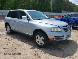 2007 Volkswagen Touareg V6 z VIN WVGZE77L57D000964, wystawiony jako IAAI lot #42159667 z przebiegiem 143 542 mil mil oraz . Historia ofert i sprzedaży dostępna na DreamBid. Obrazek 1.