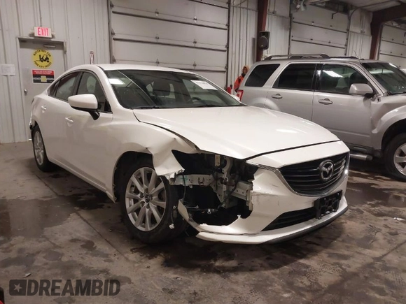 2016 Mazda Mazda6 i Sport with VIN JM1GJ1U54G1473671, listed as a IAAI auction lot 41576038 with 88,386 mi miles. Bid and sale history available at carsss.com. Image 1.