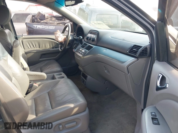 2010 Honda Odyssey EX-L with VIN 5FNRL3H7XAB099821, listed as a IAAI auction lot 41680729 with 217,458 mi miles and . Bid and sale history available at DreamBid. Image 5.