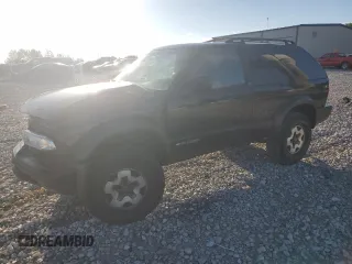 2000 Chevrolet Blazer LS z VIN 1GNCT18WXYK265020, wystawiony jako Copart lot #72423834 z przebiegiem 139 365 mil mil oraz Czysty tytuł • Clean title. Historia ofert i sprzedaży dostępna na DreamBid. Obrazek 1.