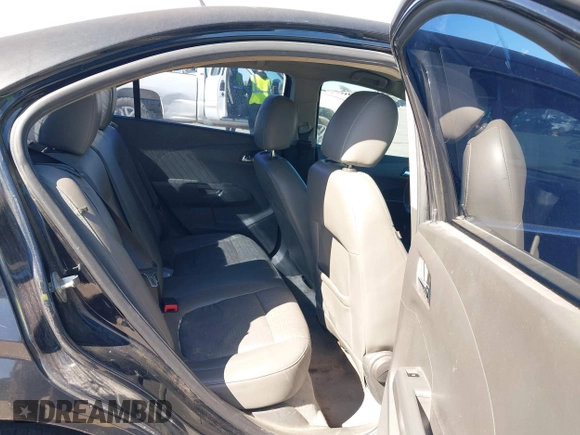 2015 Chevrolet Sonic LTZ z VIN 1G1JE5SB7F4101368, wystawiony jako IAAI lot #41742156 z przebiegiem 143 865 mil mil oraz . Historia ofert i sprzedaży dostępna na DreamBid. Obrazek 8.