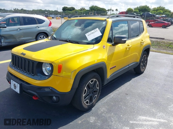 2017 Jeep Renegade Deserthawk with VIN ZACCJBCB3HPF81874, listed as a IAAI auction lot 42190315 with 51,694 mi miles and . Bid and sale history available at DreamBid. Image 2.