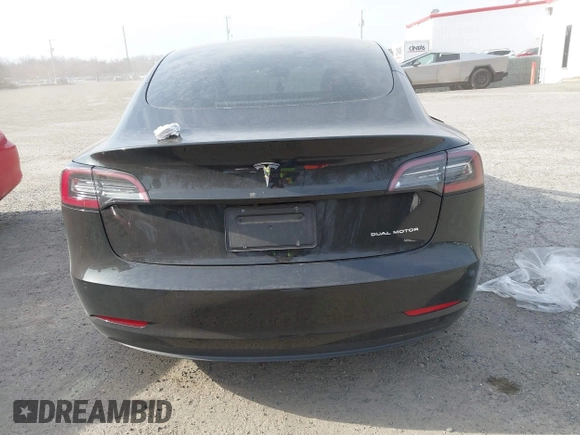 2022 Tesla Model 3 Long Range with VIN 5YJ3E1EB6NF343869, listed as a IAAI auction lot 41826077 with 36,643 mi miles and . Bid and sale history available at DreamBid. Image 15.