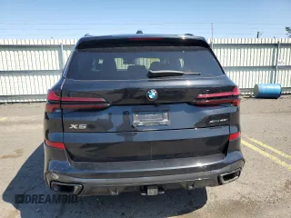 2024 BMW X5 xDrive40i z VIN 5UX23EU06R9V66999, wystawiony jako Copart lot #51369505 z przebiegiem Nie podano mil oraz Szkody całkowita. Historia ofert i sprzedaży dostępna na DreamBid. Obrazek 6.