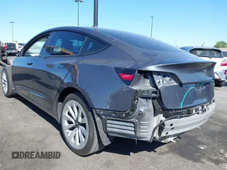 2023 Tesla Model 3 with VIN 5YJ3E1EA2PF640289, listed as a IAAI auction lot 42000200 with 14,194 mi miles and . Bid and sale history available at DreamBid. Image 3.