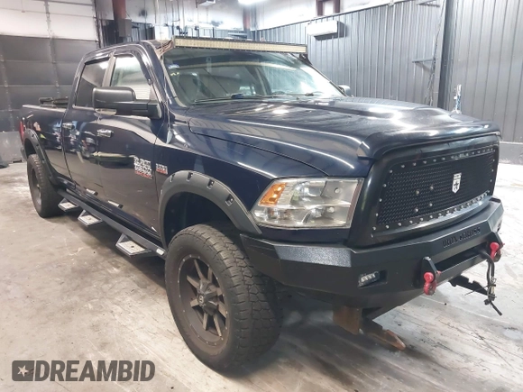 2013 Ram 2500 SLT z VIN 3C6TR5JT1DG566895, wystawiony jako IAAI lot #42096955 z przebiegiem 168 454 mil mil oraz . Historia ofert i sprzedaży dostępna na DreamBid. Obrazek 1.