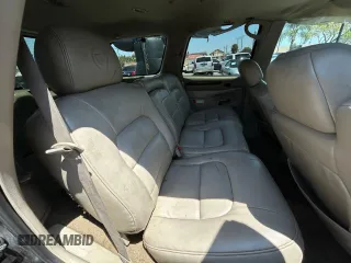 2002 Cadillac Escalade z VIN 1GYEC63T22R113253, wystawiony jako Copart lot #56408115 z przebiegiem 249 604 mil mil oraz Szkody całkowita. Historia ofert i sprzedaży dostępna na DreamBid. Obrazek 6.