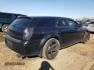 2005 Dodge Magnum RT with VIN 2D4GV58215H587205, listed as a Copart auction lot 72400054 with 115,534 mi miles and Salvage Title. Bid and sale history available at carsss.com. Image 3.