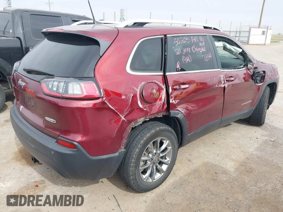 2021 Jeep Cherokee Latitude Plus with VIN 1C4PJMLB8MD147844, listed as a IAAI auction lot 42073064 with 93,197 mi miles and . Bid and sale history available at DreamBid. Image 4.