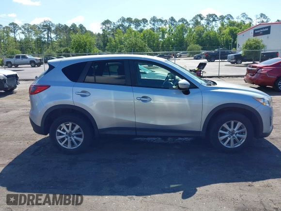 2016 Mazda CX-5 Touring z VIN JM3KE4CY4G0646114, wystawiony jako IAAI lot #42269181 z przebiegiem 58 252 mil mil oraz . Historia ofert i sprzedaży dostępna na DreamBid. Obrazek 14.