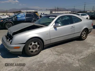 1999 Mercedes-Benz CLK 320/430 with VIN WDBLJ65G9XF065356, listed as a Copart auction lot 73586424 with 228,410 mi miles and Salvage Title. Bid and sale history available at DreamBid. Image 1.