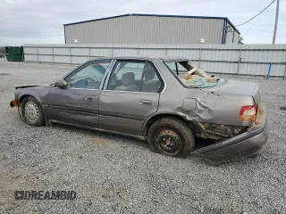 1993 Honda Accord LX with VIN 1HGCB7551PA000969, listed as a Copart auction lot 78876294 with 281,594 mi miles and Salvage Title. Bid and sale history available at carsss.com. Image 2.
