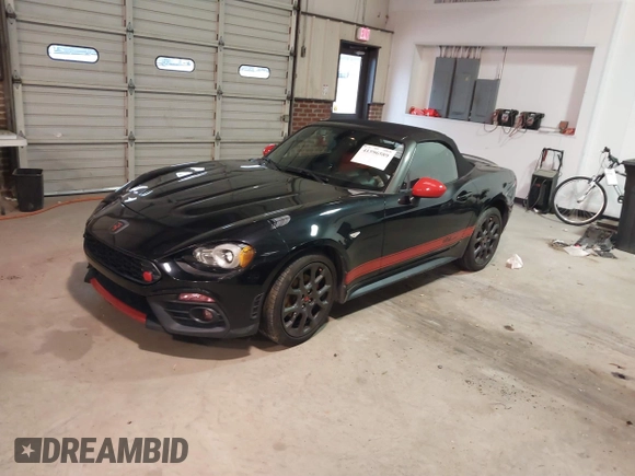 2018 FIAT 124 Spider Classica z VIN JC1NFAEK8J0133673, wystawiony jako IAAI lot #41596589 z przebiegiem 55 703 mil mil oraz . Historia ofert i sprzedaży dostępna na DreamBid. Obrazek 17.