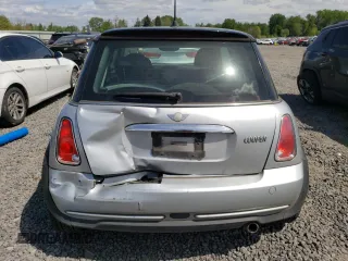 2006 MINI Hardtop with VIN WMWRC33546TK70683, listed as a Copart auction lot 54929365 with 109,484 mi miles and Salvage title. Bid and sale history available at DreamBid. Image 6.