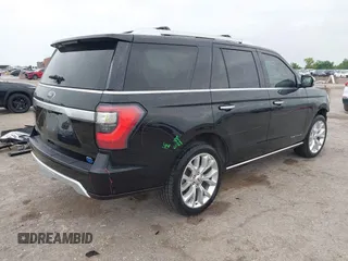 2019 Ford Expedition Platinum with VIN 1FMJU1LT1KEA23423, listed as a IAAI auction lot 42134271 with 59,180 mi miles and . Bid and sale history available at DreamBid. Image 4.