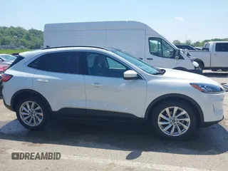 2021 Ford Escape Titanium with VIN 1FMCU9J91MUA29407, listed as a IAAI auction lot 42120442 with 19,314 mi miles and . Bid and sale history available at DreamBid. Image 13.
