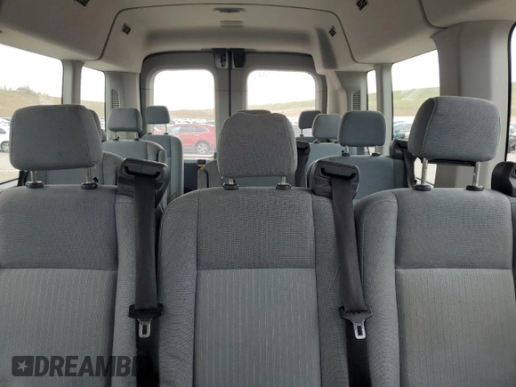 2015 Ford Transit XL z VIN 1FBAX2CM9FKA64565, wystawiony jako Copart lot #52207435 z przebiegiem 186 751 mil mil oraz Szkoda całkowita • Salvage title. Historia ofert i sprzedaży dostępna na DreamBid. Obrazek 10.