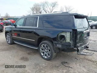 2016 GMC Yukon XL Denali with VIN 1GKS2HKJ8GR139858, listed as a IAAI auction lot 41915183 with 151,830 mi miles. Bid and sale history available at carsss.com. Image 3.