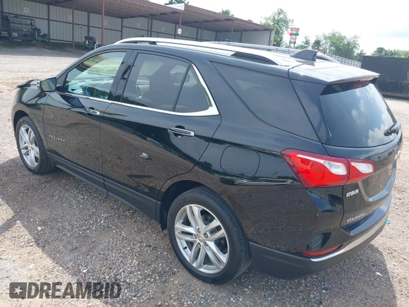 2021 Chevrolet Equinox Premier with VIN 2GNAXNEV5M6151910, listed as a IAAI auction lot 42110010 with 45,911 mi miles and . Bid and sale history available at DreamBid. Image 3.