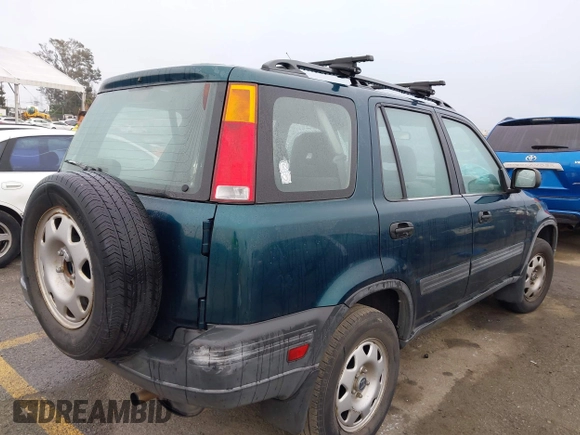 1998 Honda CR-V LX z VIN JHLRD1749WC068852, wystawiony jako IAAI lot #41915089 z przebiegiem 241 163 mil mil oraz . Historia ofert i sprzedaży dostępna na DreamBid. Obrazek 4.