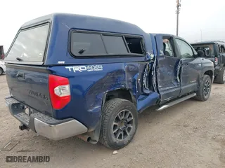 2014 Toyota Tundra 4WD Truck SR with VIN 5TFUY5F1XEX352184, listed as a IAAI auction lot 40732632 with 107,262 mi miles. Bid and sale history available at carsss.com. Image 4.