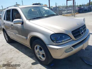 2002 Mercedes-Benz M-Class with VIN 4JGAB54E52A298975, listed as a IAAI auction lot 41985135 with 278,592 mi miles. Bid and sale history available at carsss.com. Image 1.