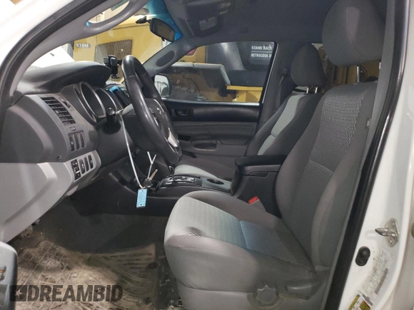 2015 Toyota Tacoma with VIN 5TFLU4EN2FX112036, listed as a Copart auction lot 50275385 with 135,503 mi miles and Salvage Title. Bid and sale history available at DreamBid. Image 7.