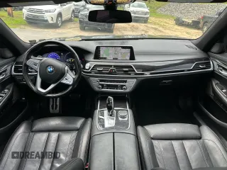 2019 BMW 7 Series 740i xDrive with VIN WBA7E4C55KGV28722, listed as a Copart auction lot 64955445 with 94,901 mi miles and Clean title. Bid and sale history available at DreamBid. Image 6.