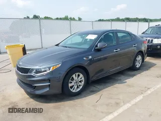 2016 Kia Optima LX with VIN KNAGT4L33G5111199, listed as a IAAI auction lot 42380970 with 97,072 mi miles and . Bid and sale history available at DreamBid. Image 2.