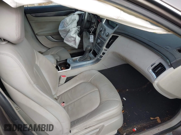 2012 Cadillac CTS with VIN 1G6DA5E50C0152500, listed as a IAAI auction lot 41864677 with 163,594 mi miles and . Bid and sale history available at DreamBid. Image 5.