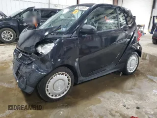 2015 Smart fortwo Passion with VIN WMEEJ3BA6FK820446, listed as a Copart auction lot 63243635 with Not provided miles and Salvage title. Bid and sale history available at DreamBid. Image 1.