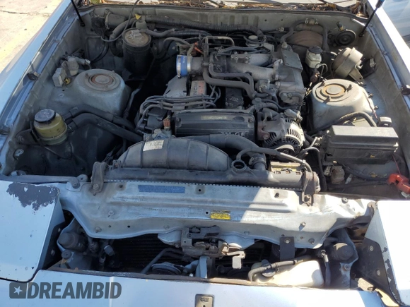 1989 Toyota Supra z VIN JT2MA70J8K0120446, wystawiony jako Copart lot #75893804 z przebiegiem 283 887 mil mil oraz Szkoda całkowita • Salvage title. Historia ofert i sprzedaży dostępna na DreamBid. Obrazek 11.