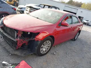 2014 Toyota Camry L with VIN 4T1BF1FK3EU770985, listed as a IAAI auction lot 41896125 with 146,100 mi miles. Bid and sale history available at carsss.com. Image 2.