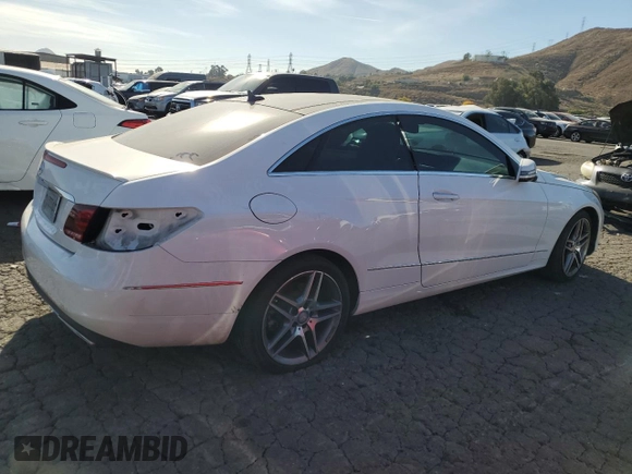 2015 Mercedes-Benz E 400 with VIN WDDKJ6FB0FF294447, listed as a Copart auction lot 84929364 with 96,689 mi miles and Salvage title. Bid and sale history available at DreamBid. Image 3.