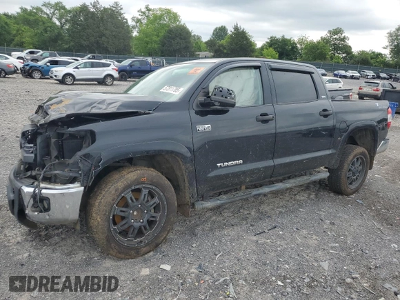 2014 Toyota Tundra SR5 with VIN 5TFEY5F14EX165589, listed as a Copart auction lot 57311785 with 165,343 mi miles and Salvage title. Bid and sale history available at DreamBid. Image 1.