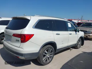 2016 Honda Pilot Touring with VIN 5FNYF6H97GB088824, listed as a IAAI auction lot 41991803 with 84,761 mi miles. Bid and sale history available at carsss.com. Image 4.