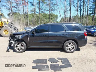 2016 Dodge Durango Limited with VIN 1C4RDJDG5GC302241, listed as a IAAI auction lot 41877415 with 135,586 mi miles and . Bid and sale history available at DreamBid. Image 14.