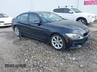 2016 BMW 4 Series 428i xDrive with VIN WBA4C9C52GG136584, listed as a IAAI auction lot 41530110 with 124,667 mi miles and . Bid and sale history available at carsss.com. Image 1.