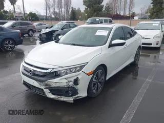 2017 Honda Civic EX-L z VIN 2HGFC1F79HH635156, wystawiony jako IAAI lot #41922115 z przebiegiem 142 565 mil mil oraz . Historia ofert i sprzedaży dostępna na DreamBid. Obrazek 6.