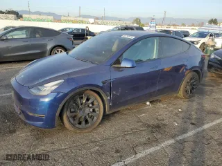 2021 Tesla Model Y Long Range with VIN 5YJYGDEE4MF160352, listed as a Copart auction lot 86790974 with 55,524 mi miles and Salvage Title. Bid and sale history available at carsss.com. Image 1.
