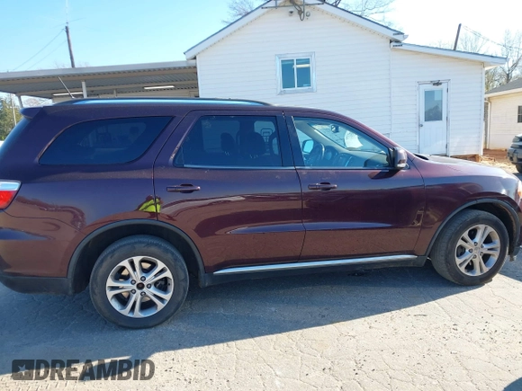 2012 Dodge Durango Crew with VIN 1C4RDHDG9CC330644, listed as a IAAI auction lot 41889758 with 194,295 mi miles and . Bid and sale history available at DreamBid. Image 14.